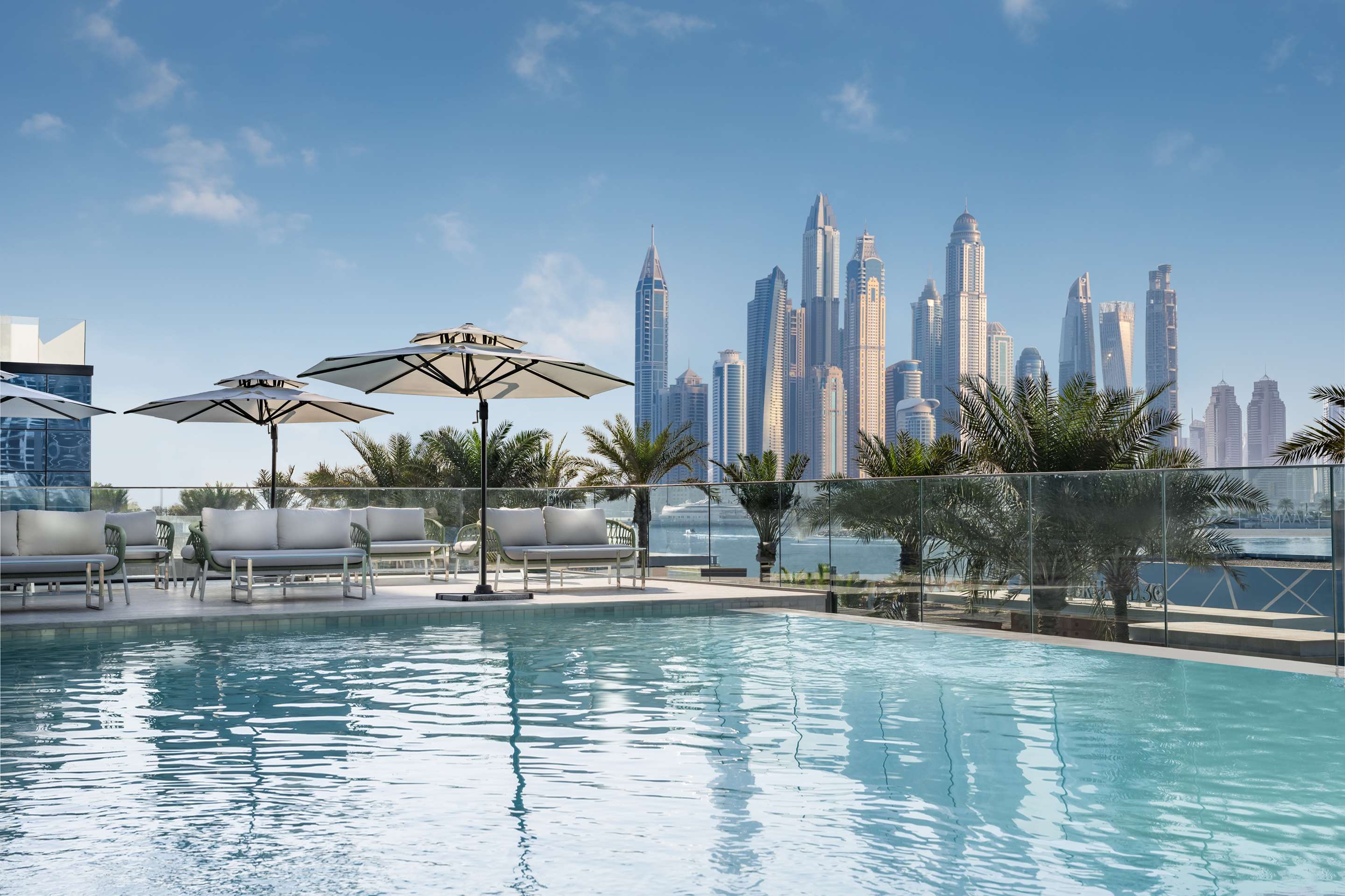 https://radissonhotels.iceportal.com/image/radisson-beach-resort-palm-jumeirah-dubai/pool/16256-147704-f74747881_3XL.jpg